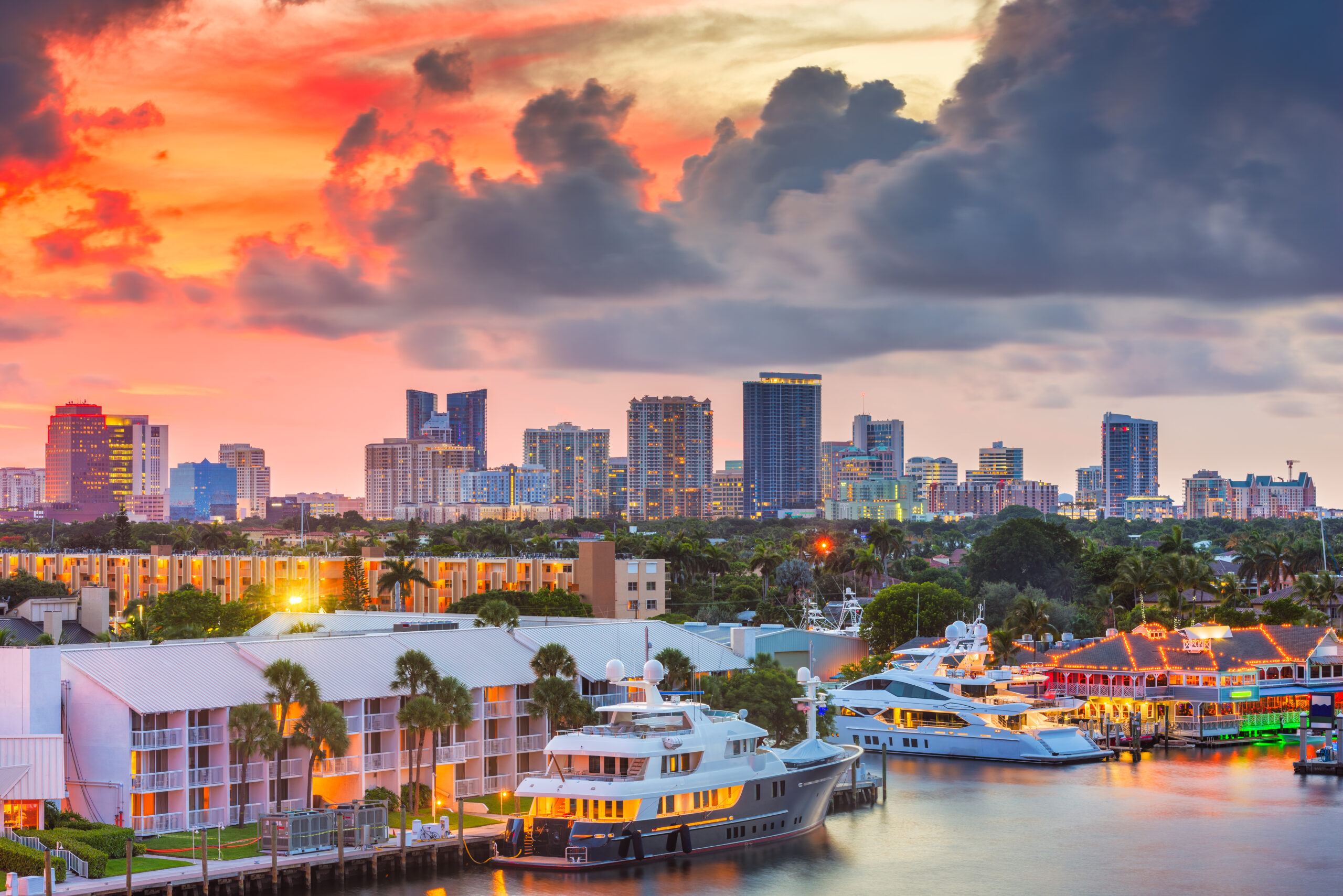 Fort Lauderdale, Florida, USA skyline and river at dusk.